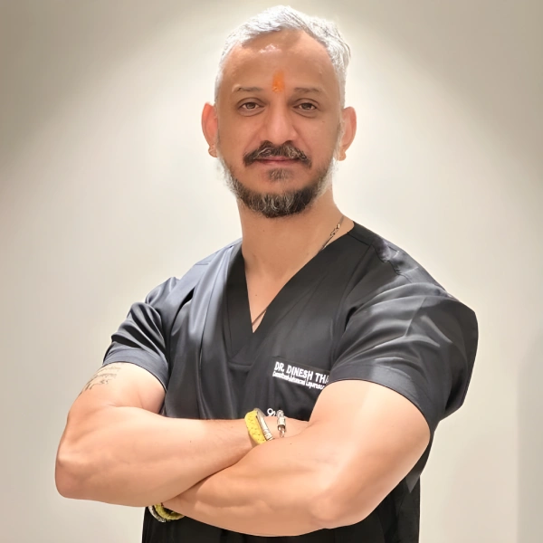 Dr. Dinesh Thakur